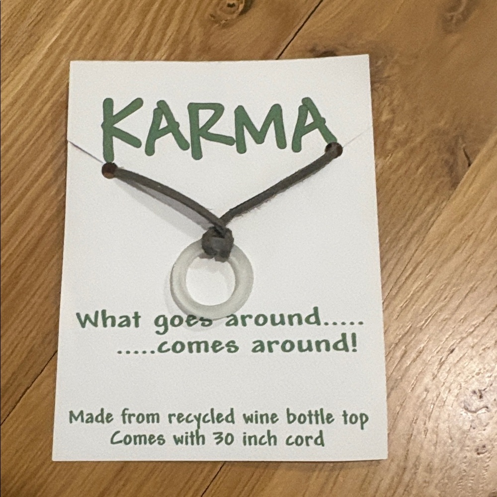 ✨🆕 “Karma" necklace features a pendant made from a recycled wine bottle top